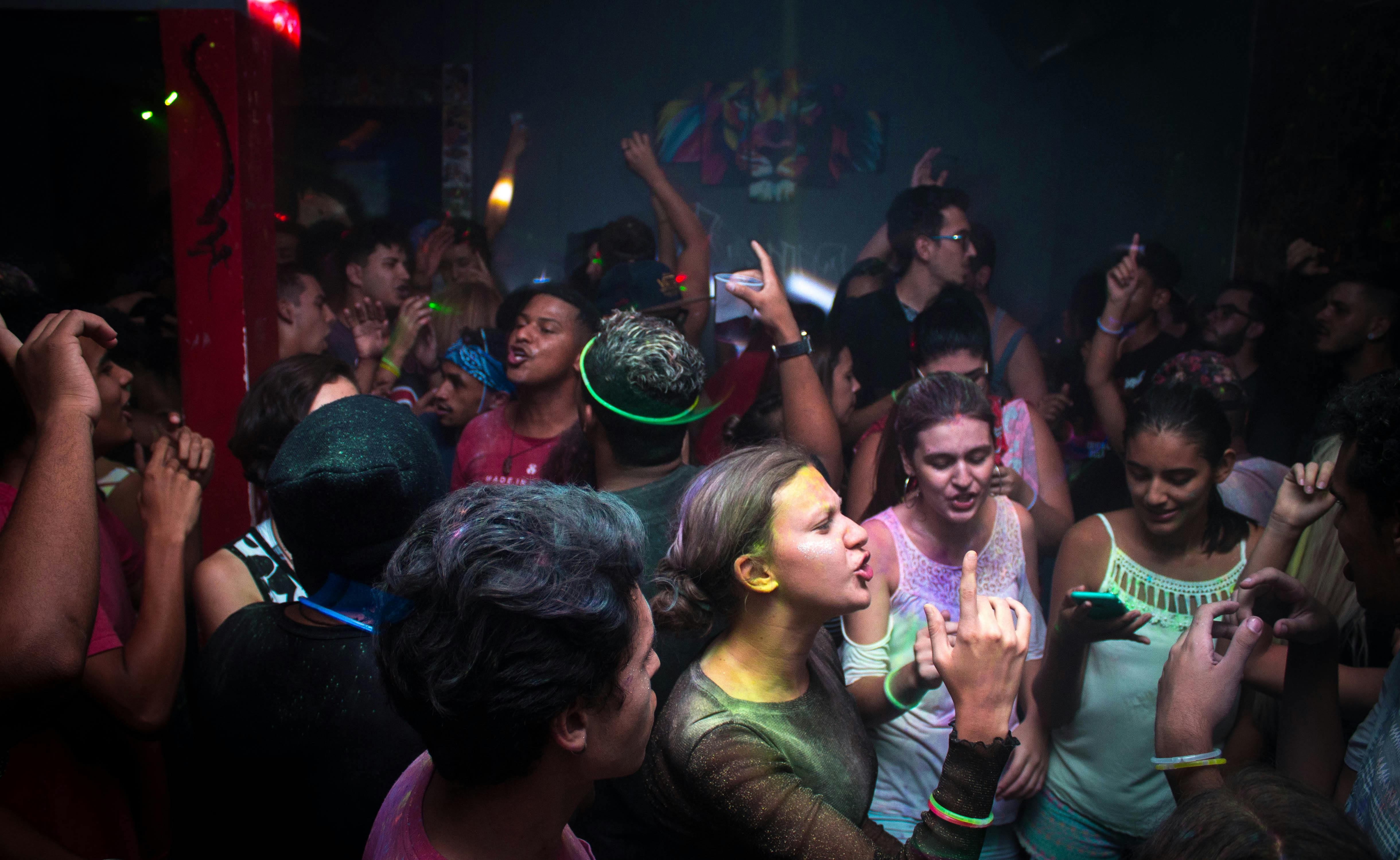 People engaged at a nightclub event